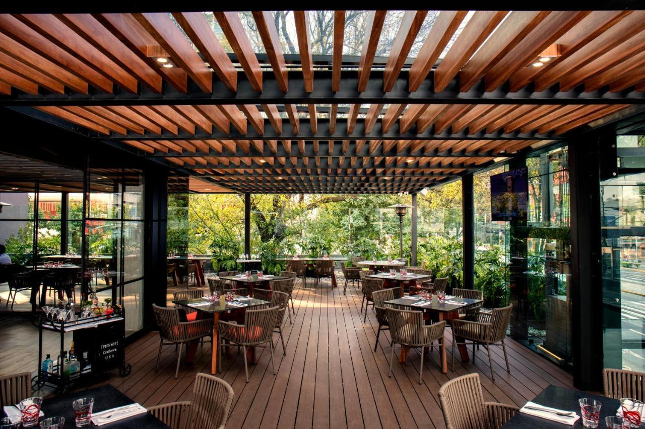 Krystal Grand Suites Insurgentes Мехико Экстерьер фото Restaurant in the hotel