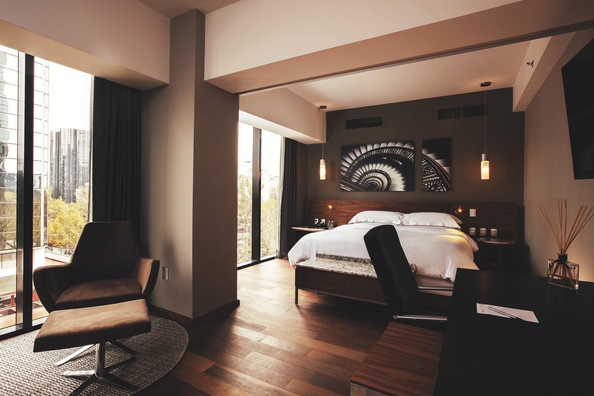 Krystal Grand Suites Insurgentes Мехико Экстерьер фото A bedroom at the hotel