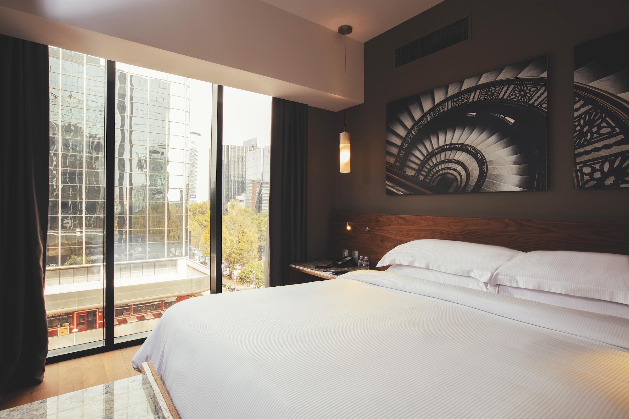 Krystal Grand Suites Insurgentes Мехико Экстерьер фото A room at the hotel