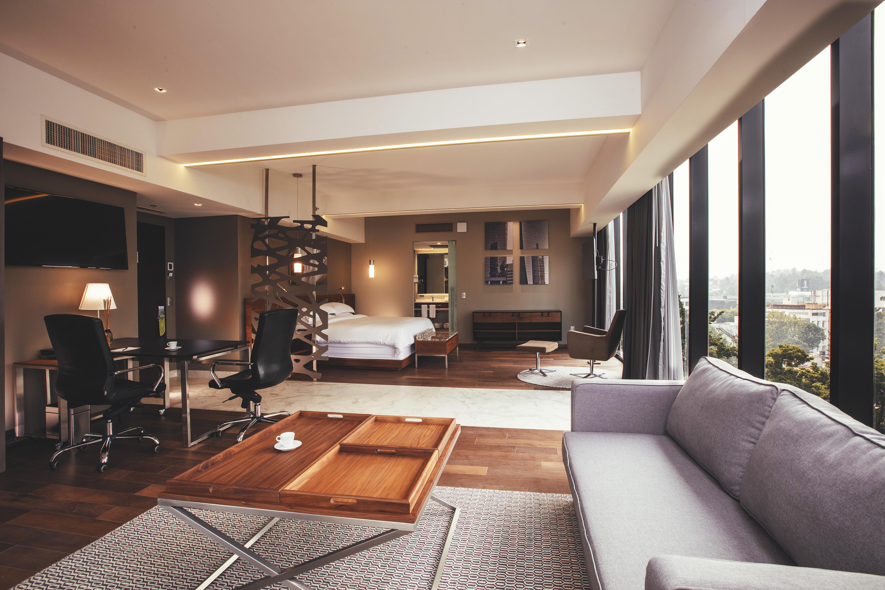 Krystal Grand Suites Insurgentes Мехико Экстерьер фото A suite at the hotel