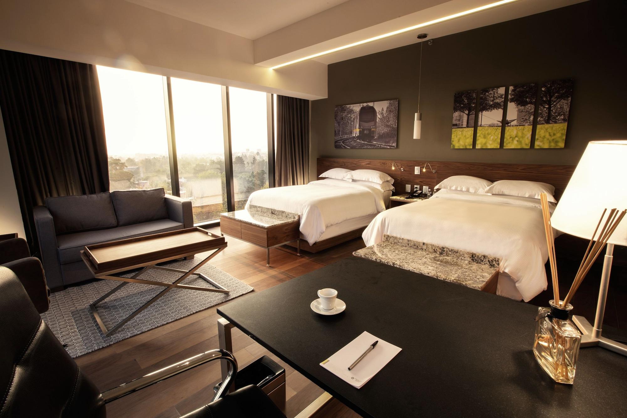 Krystal Grand Suites Insurgentes Мехико Экстерьер фото A room at the hotel