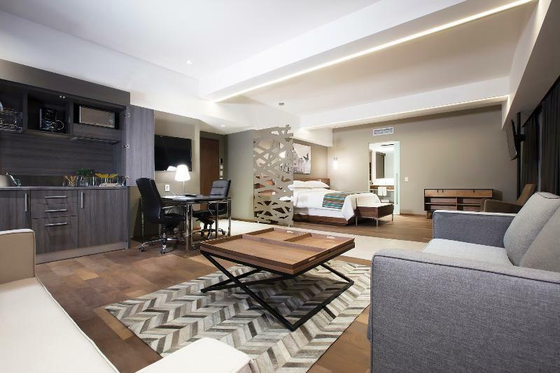 Krystal Grand Suites Insurgentes Мехико Экстерьер фото A suite at the hotel
